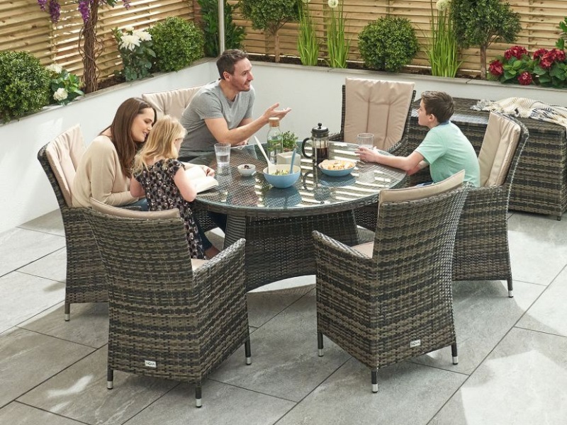 brown round outdoor dining table